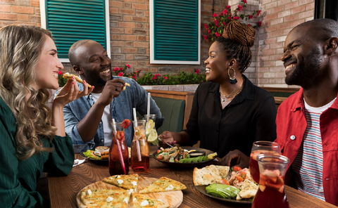 Spur Gifting image - man smiling while looking at his phone